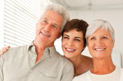 an older couple with their daughter